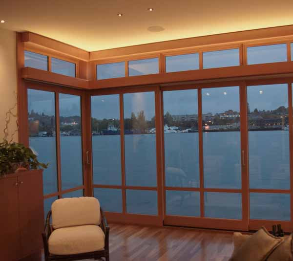 recessed lighting about floor to ceiling windows